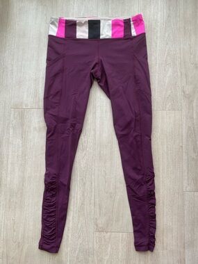 Lululemon Ruffle Hem Length Leggings Purple Striped Waistband Zip Pocket Side